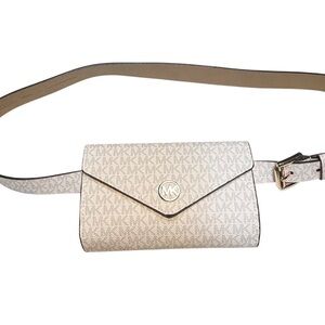 Michael Kors logo canvas belt bag with a front flap closure gold-tone hardware